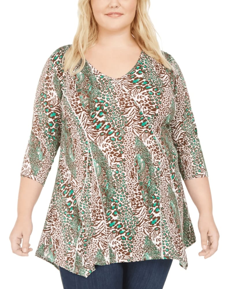 Front of a model wearing a size 1X NY Collection Women's Plus Size Printed Handkerchief-Hem Top Green Size 1X in Green by NY Collection. | dia_product_style_image_id:311275